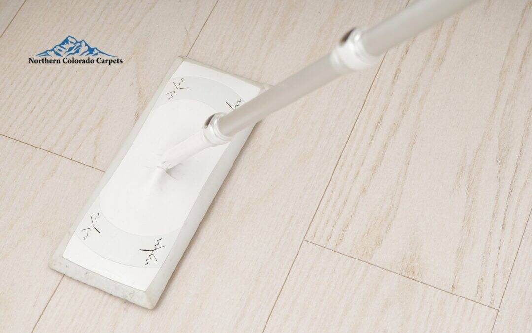 Someone cleaning a hardwood floor in Norther Colorado.